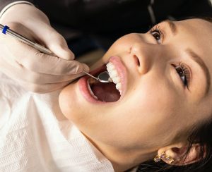Lady With Good Teeth Having Check Up
