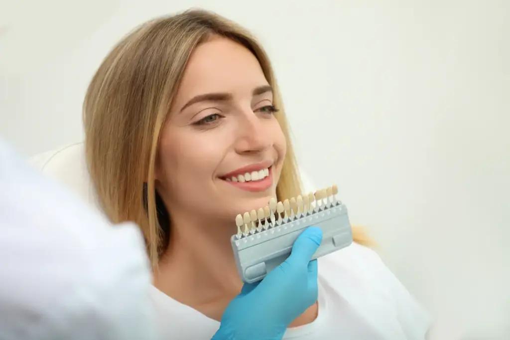 Doctor Matching Patient`s Teeth Color 