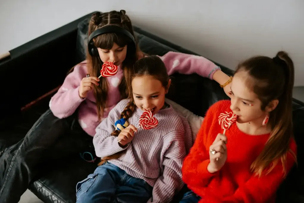 Little Girls Eating A Lollipop 
